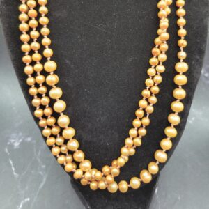 Golden, hand knotted, tri strand, freshwater pearl necklace